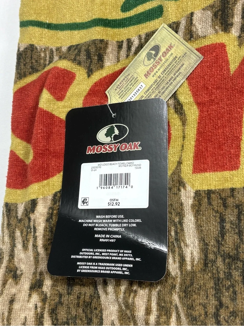 Mossy Oak Camouflage Towel with Red and Yellow Accents